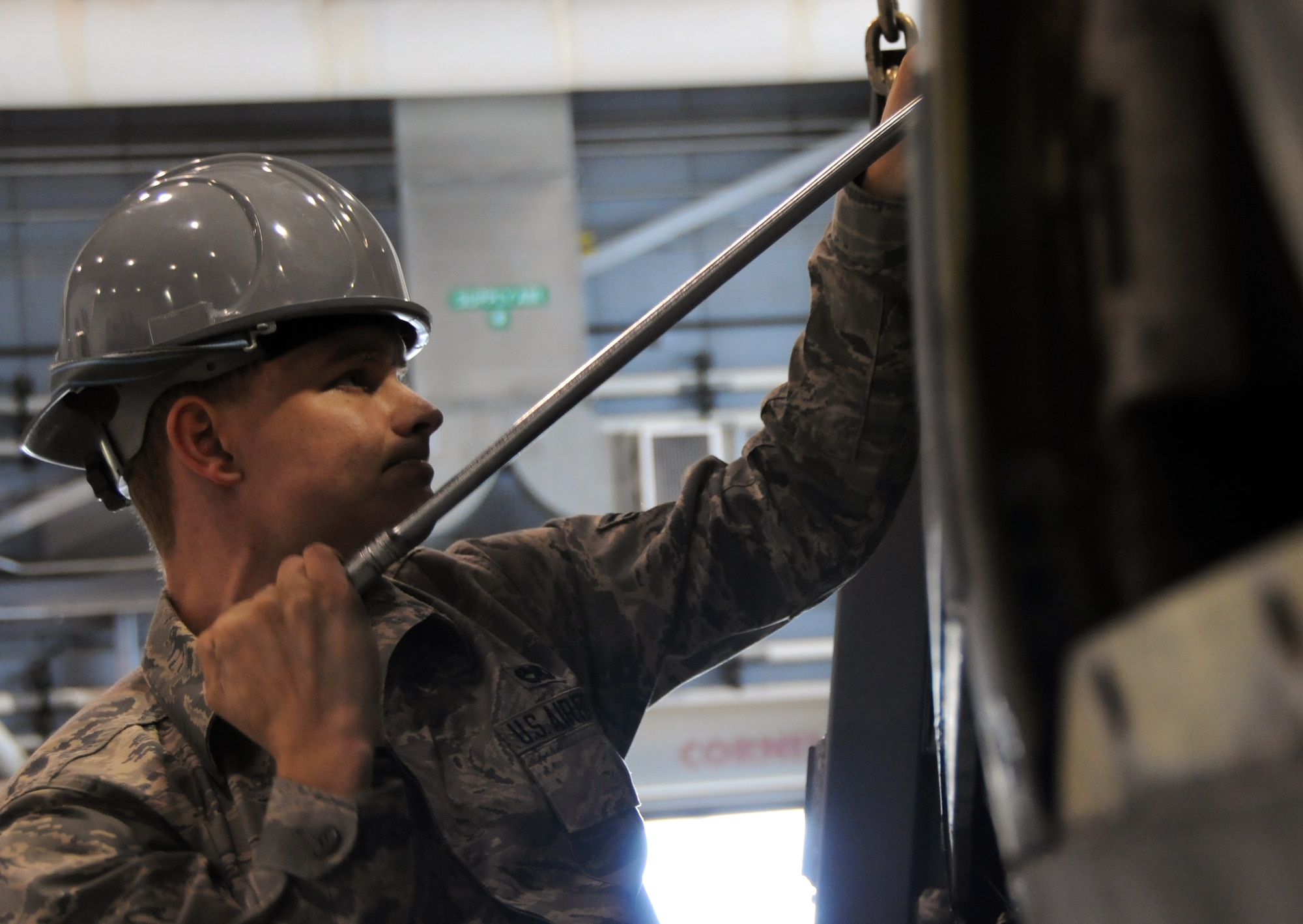 Airman 1st Class Matthew Brady, 94th Maintenance Squadron aerospace propulsion technician, works on the engine of a C-130 Hercules at Dobbins Air Reserve Base, Ga., Sept. 25, 2014. A team of 44 Airmen and one C-130 are preparing to venture off to be a part of RED FLAG-Alaska 15-1. (U.S. Air Force photo by Senior Airman Daniel Phelps/Released)