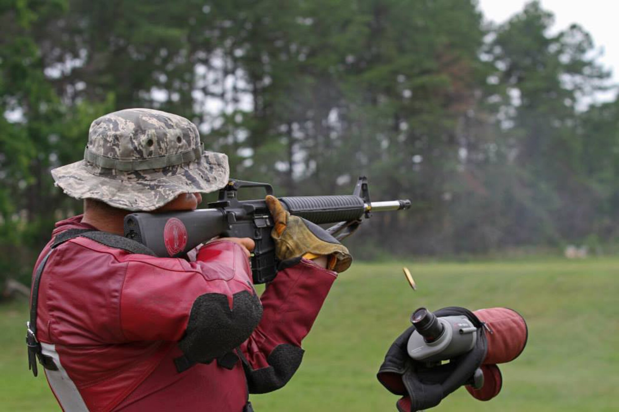 Rifle butt position secured in shoulder….check. Proper grip and stance….check. Rifle sight aligned with target…...check. Target hit….check. Tech. Sgt. Daniel Rodriguez, an RF transmission specialist at the 162nd Wing in Tucson, Ariz., fires an AR-15 down range during the Interservice Rifle Championships held at Marine Corps Base Quantico in Virginia, July 2014. (Courtesy of Donnie Hicks)