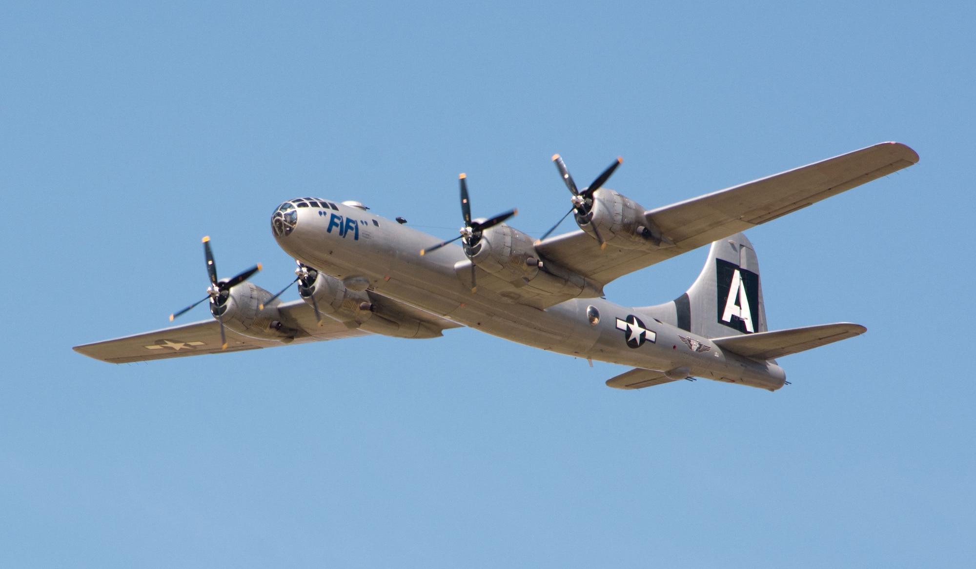 A B-29 Superfortress known as “Fifi” performs a flyover at Vance Sept. 22. The plane landed at Woodring Regional Airport, Enid, Oklahoma, after the flyover. Student pilots, other members of Team Vance and Enid locals got to walk through the aircraft which is the only operational B-29 in the world. (U.S. Air Force photo/Terry Wasson)
