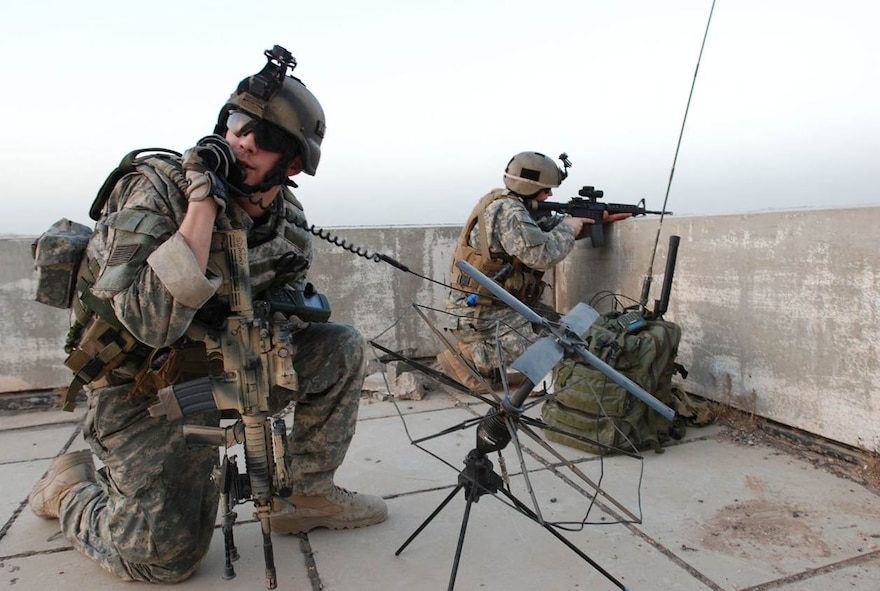 Tatical Air Control Party specialists provide over-watch of friendly forces in an undisclosed location utlizing a PSN-13 global positioning system and an AN/PRC-117F multiband manpack radio. TACPs use a variety of equipment to call in close-air support for ground forces. The TACP-Modernization program office at Hanscom AFB, Mass., is charged with equipping TACP Airmen with the necessary communication tools. (courtesy photo) 