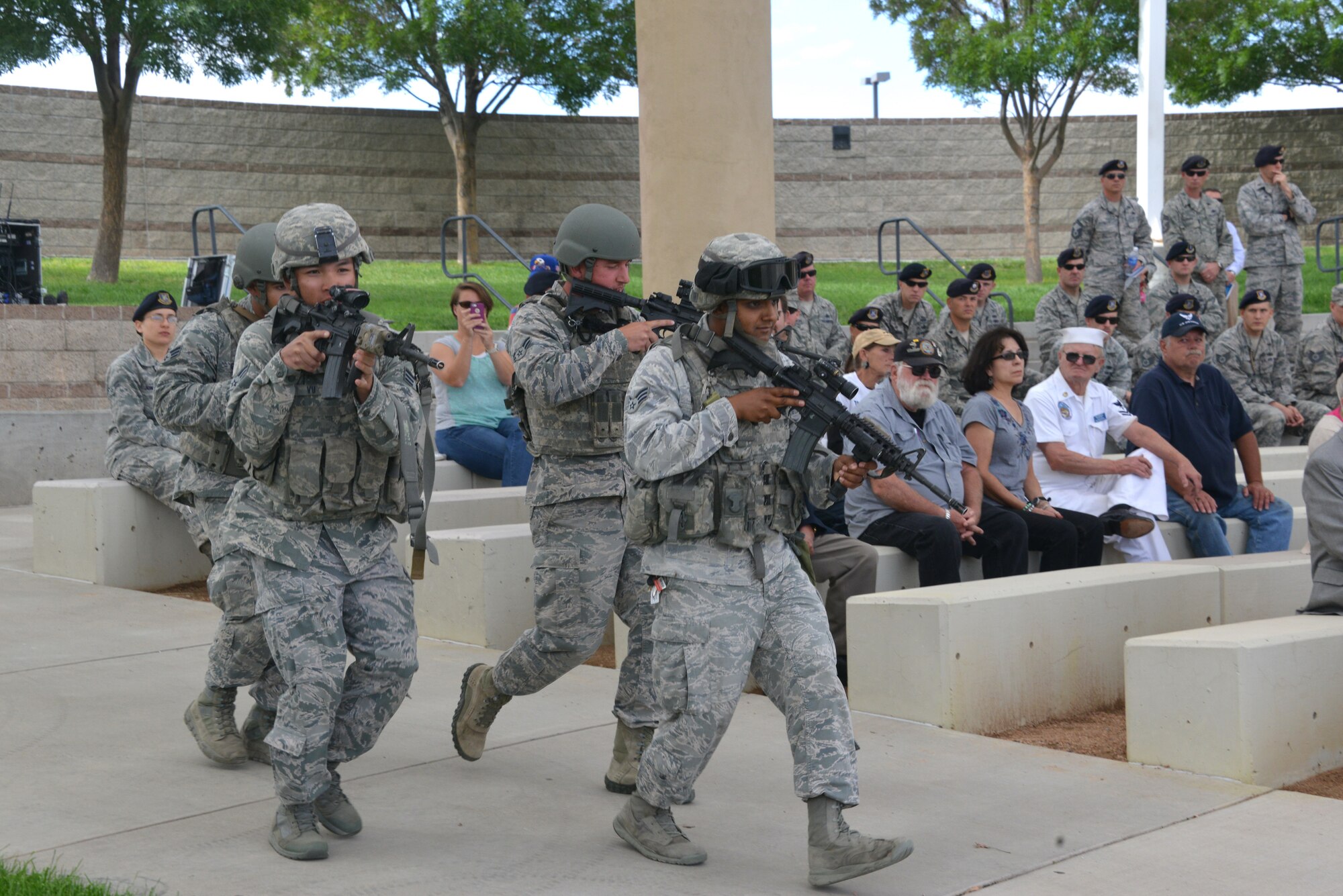 Kirtland Airmen reenact the rescue of a prisoner of war at the POW MIA Recognition Day ceremony Sept. 19 at the New Mexico Veteran's Memorial Amphitheater. (Photo by Dennis Carlson)