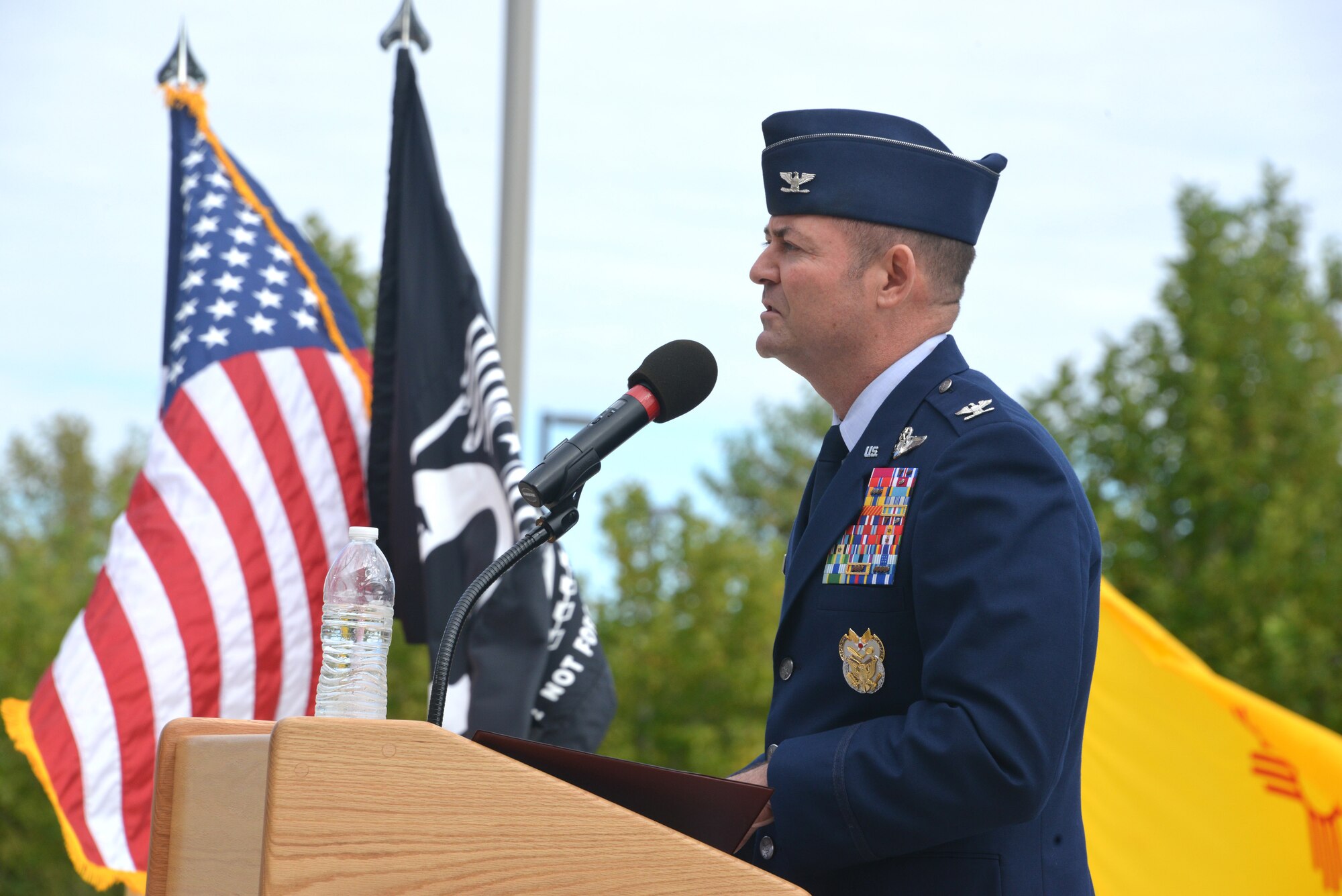 Col. Richard Coe, Air Force Inspection Agency commander, delivers remarks at the POW MIA Recognition Day ceremony Sept. 19 at the New Mexico Veteran's Memorial Amphitheater. (Photo by Dennis Carlson)