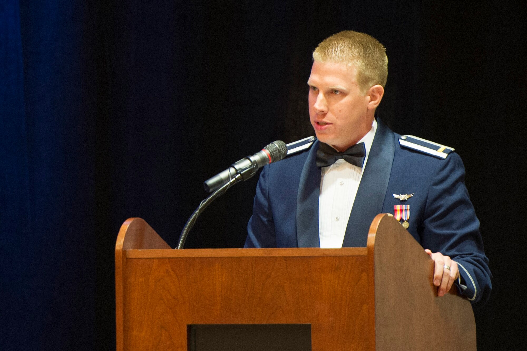 Second Lt. Jacob Myers, 1st Range Operations Squadron and emcee, speaks to guests during the Air Force Ball, an event hosted to celebrate the U.S. Air Force’s birthday, in Melbourne, Fla., Sept. 19, 2014. Though Sept. 18, 1947, is seen as the official birth of the Air Force as we know it today, the truth is that the Air Force has a rich history that can be traced as far back as to the Civil War with the Union Army Balloon Corps. (U.S. Air Force photo/Matthew Jurgens) (Released) 