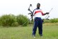 Former U.S. Air National Guard Senior Airman Dwayne Parker pulls an arrow from his quiver at Langley Air Force Base, Va., Sep. 23, 2014. Parker established an adaptive sports community in the Hampton Roads, Va., area with the intent of providing wounded veterans mentally and physically therapeutic activities. His not-for-profit program, called Wounded Warrior Adaptive Sports, gets local wounded veterans involved in physical activities and helps them by supplying clothing, food and financial support. (U.S. Air Force photo by Airman 1st Class Devin Scott Michaels)