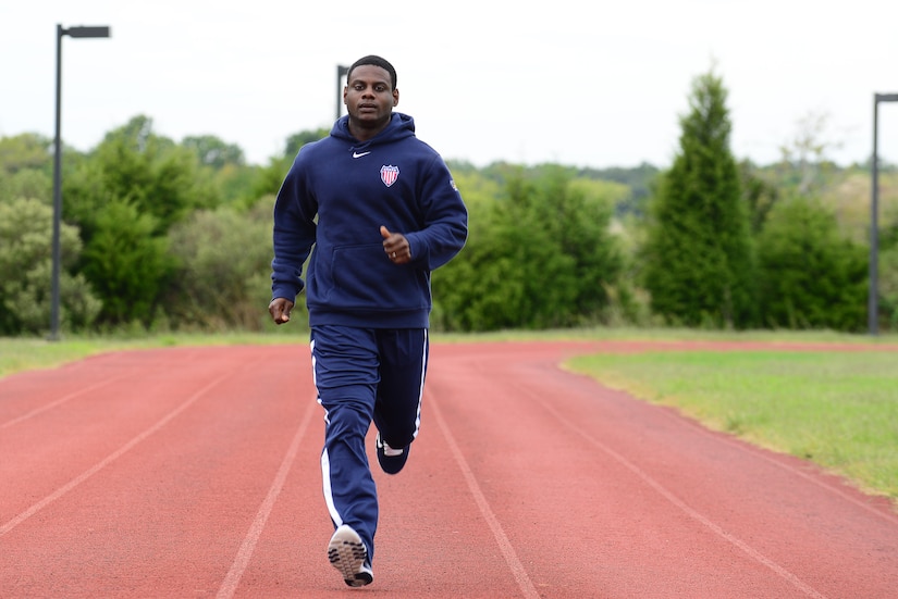 Former U.S. Air National Guard Senior Airman Dwayne Parker runs on Shellbank track at Langley Air Force Base, Va., Sep. 23, 2014. Parker’s right eye was blinded during a deployment and he has since begun competing in adaptive sports. (U.S. Air Force photo by Airman 1st Class Devin Scott Michaels)