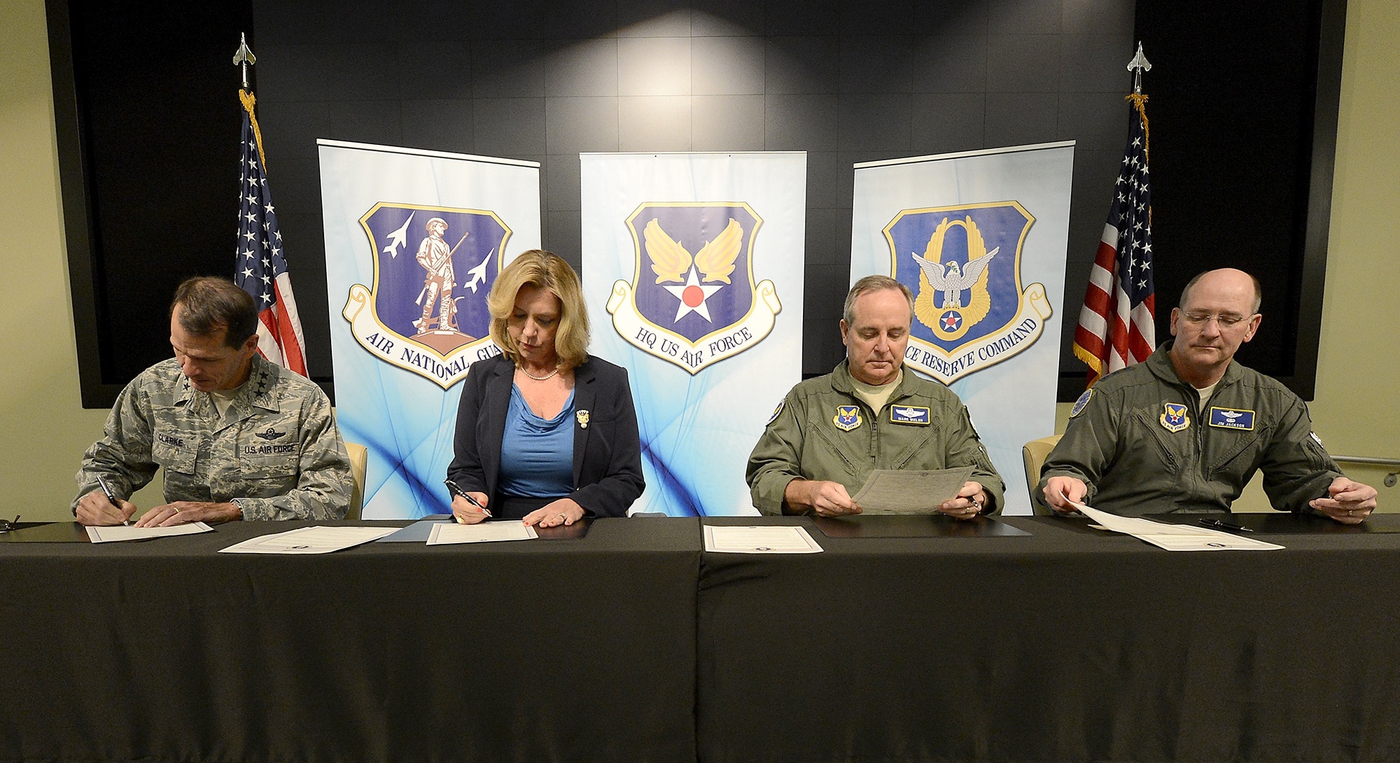 Leaders of the Air Force and the Air Reserve Component sign the Total Force Aircrew Management charter Sept. 18, 2014, during the Aircrew Summit at Joint Base Andrews, Maryland. From left to right, Director of Air National Guard Lt. Gen. Stanley E. Clarke; Secretary of the Air Force Deborah Lee James; Air Force Chief of Staff Gen. Mark A. Welsh, III; and Chief of Air Force Reserve Lt. Gen. James A. Jackson, prepare to sign the charter, which integrates total-force management of resources across the active duty, Guard and Reserve to maximize combat readiness. (U.S. Air Force photo/Scott Ash) 

