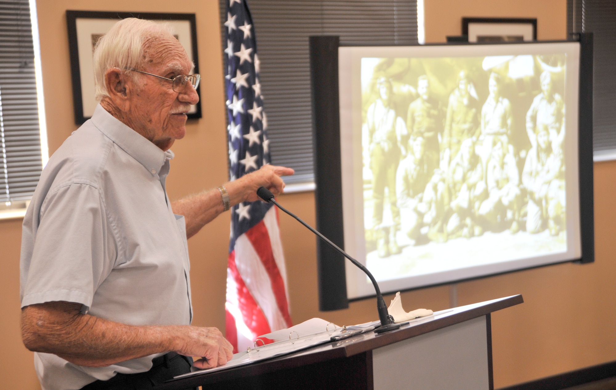 Retired 2nd Lt. William Whitaker talks about his time as a prisoner of war during World War II to over 100 Airmen during a breakfast as part of POW/MIA Remembrance Week, Sept 15, 2014, at Creech Air Force Base, Nevada. POW/MIA Remembrance Week was sponsored by the Air Force Sergeants Association Chapter 1253, and included a patriotic movie night, a 5K memorial run, 24-hour vigilance run, and a formal retreat ceremony. (U.S. Air Force photo by Airman 1st Class Christian Clausen/Released)