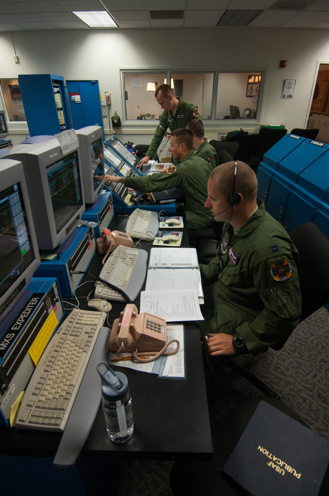 Airmen from the 576th Flight Test Squadron run a series of systems checks on a Minuteman III missile during a launch confidence check, Sep. 8, 2014, Vandenberg Air Force Base, Calif. (U.S. Air Force photo by Michael Peterson/Released)