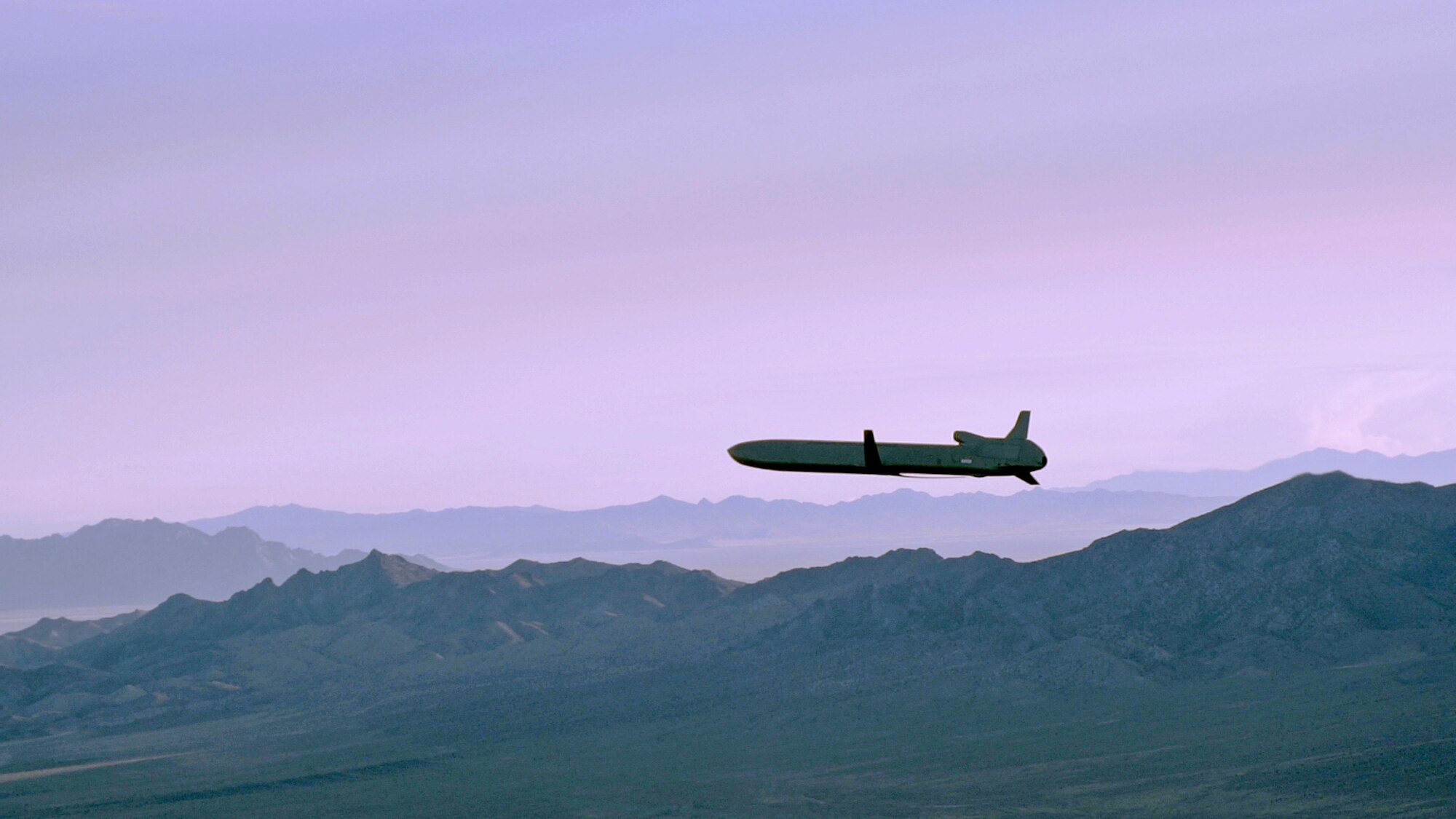 An unarmed AGM-86B Air-Launched Cruise Missile maneuvers over the Utah Test and Training Range en route to its final target during a Nuclear Weapons System Evaluation Program simulated combat mission Sept. 22, 2014. The ALCM, released from a B-52H Stratofortress flown by the 2nd Bomb Wing, Barksdale Air Force Base, Louisiana, was part of an end-to-end operational evaluation of 8th Air Force and Task Force 204’s ability to deliver the weapon from storage to its final target. (Photo by Staff Sgt. Roidan Carlson)