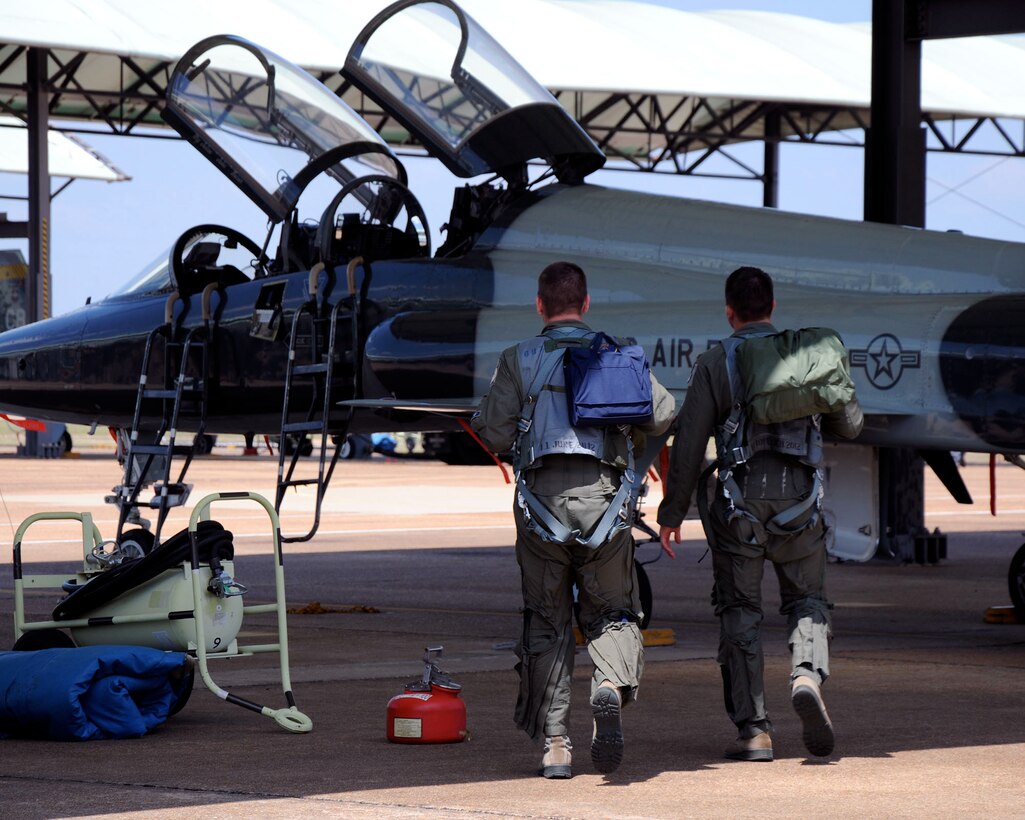 This pictures sums up the 340th Flynig Training Group's mission. The 340th FTG is organized to provide associate instructor pilots for the Air Education and Training Command SUPT mission. The Group consists of a headquarters element at Joint Base San Antonio-Randolph, Texas, six associate Reserve flying training squadrons, and a Basic Military Training squadron: the 5th FTS at Vance AFB, Oklahoma, the 39th FTS at JBSA Randolph, Texas, the 43rd FTS at Columbus AFB, Mississippi, the 70th Flight Training Squadron at the U.S. Air Force Academy, Colorado, the 96th FTS at Laughlin AFB, Texas, the 97th FTS at Sheppard AFB, Texas, and the 433rd TRS at JBSA Lackland, Texas.