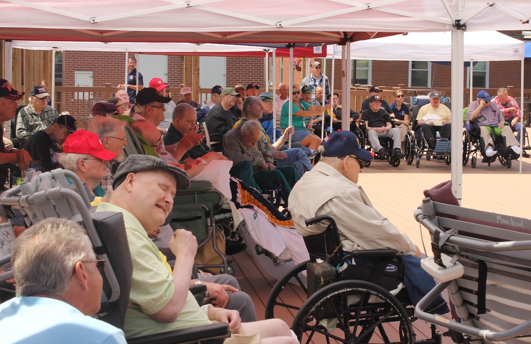 Audience members watch the Air National Guard Band of the Midwest perform during annual training at the Tomah VA Medical Center Home, Tomah, Wisc., July 5, 2014. They performed jazz, rock and concert music for audiences in Illinois and Wisconsin as part of their community relations tour before a grand finale in Minnesota July 4. The annual concert series was the result of a year’s worth of training and practice, one that the band used to celebrate patriotism with communities across the Midwest. (Courtesy photo/Released)