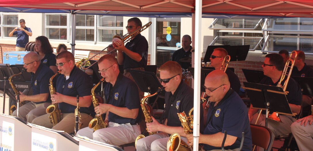 Instrumentalists with the Air National Guard Band of the Midwest's peform during annual training at the Tomah VA Medical Center Home, Tomah, Wisc., July 5, 2014. They performed jazz, rock and concert music for audiences in Illinois and Wisconsin as part of their community relations tour before a grand finale in Minnesota July 4. The annual concert series was the result of a year’s worth of training and practice, one that the band used to celebrate patriotism with communities across the Midwest. (Courtesy photo/Released)