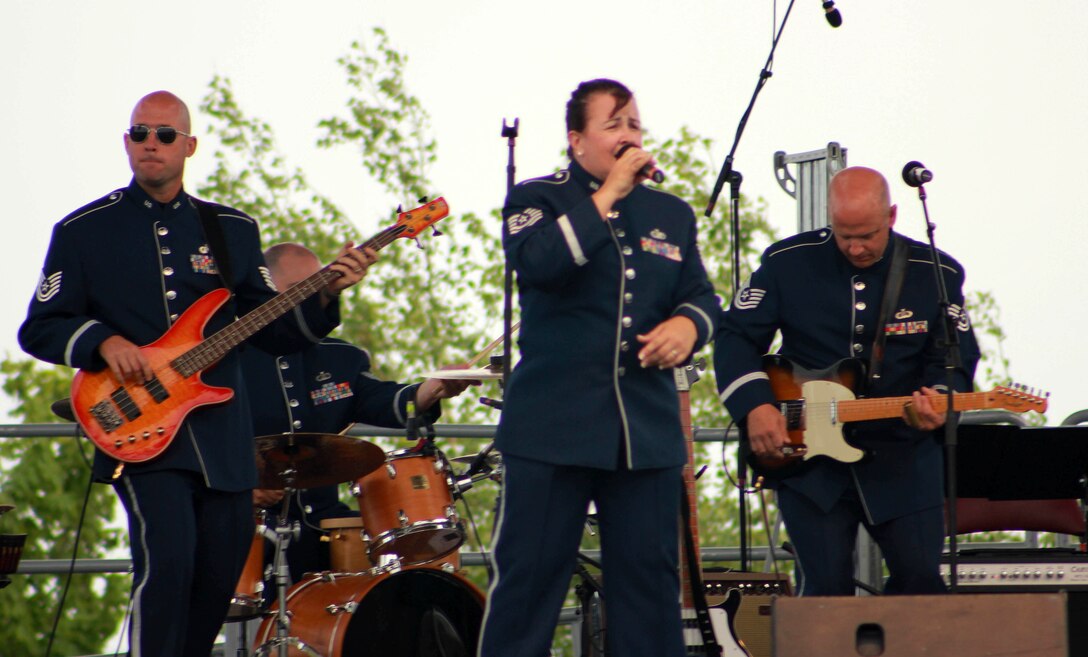 Instrumentalists with the Air National Guard Band of the Midwest perform for audiences during annual training at the Bayfront Festival Park, Duluth, Minn., July 4, 2014. They performed jazz, rock and concert music for audiences in Illinois and Wisconsin as part of their community relations tour before a grand finale in Minnesota July 4. The annual concert series was the result of a year’s worth of training and practice, one that the band used to celebrate patriotism with communities across the Midwest. (Courtesy photo/Released)
