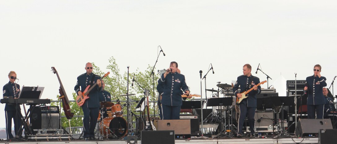 Instrumentalists with the Air National Guard Band of the Midwest perform for audiences during annual training at the Bayfront Festival Park, Duluth, Minn., July 4, 2014. They performed jazz, rock and concert music for audiences in Illinois and Wisconsin as part of their community relations tour before a grand finale in Minnesota July 4. The annual concert series was the result of a year’s worth of training and practice, one that the band used to celebrate patriotism with communities across the Midwest. (Courtesy photo/Released)