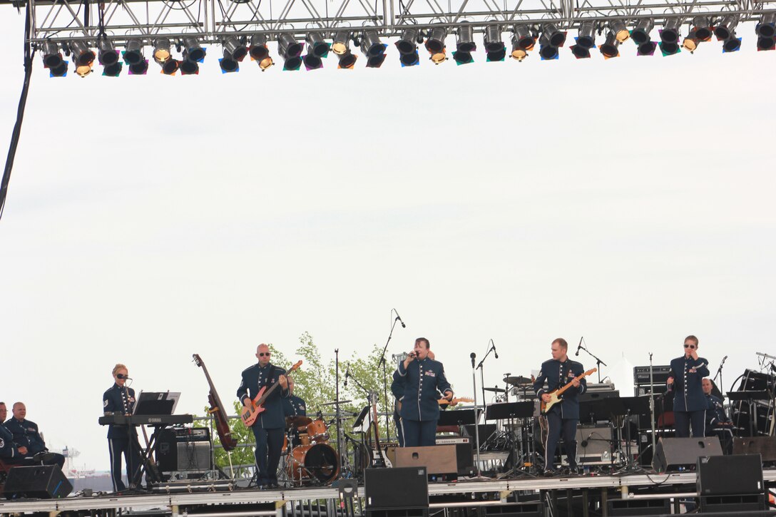 Instrumentalists with the Air National Guard Band of the Midwest perform for audiences during annual training at the Bayfront Festival Park, Duluth, Minn., July 4, 2014. They performed jazz, rock and concert music for audiences in Illinois and Wisconsin as part of their community relations tour before a grand finale in Minnesota July 4. The annual concert series was the result of a year’s worth of training and practice, one that the band used to celebrate patriotism with communities across the Midwest. (Courtesy photo/Released)
