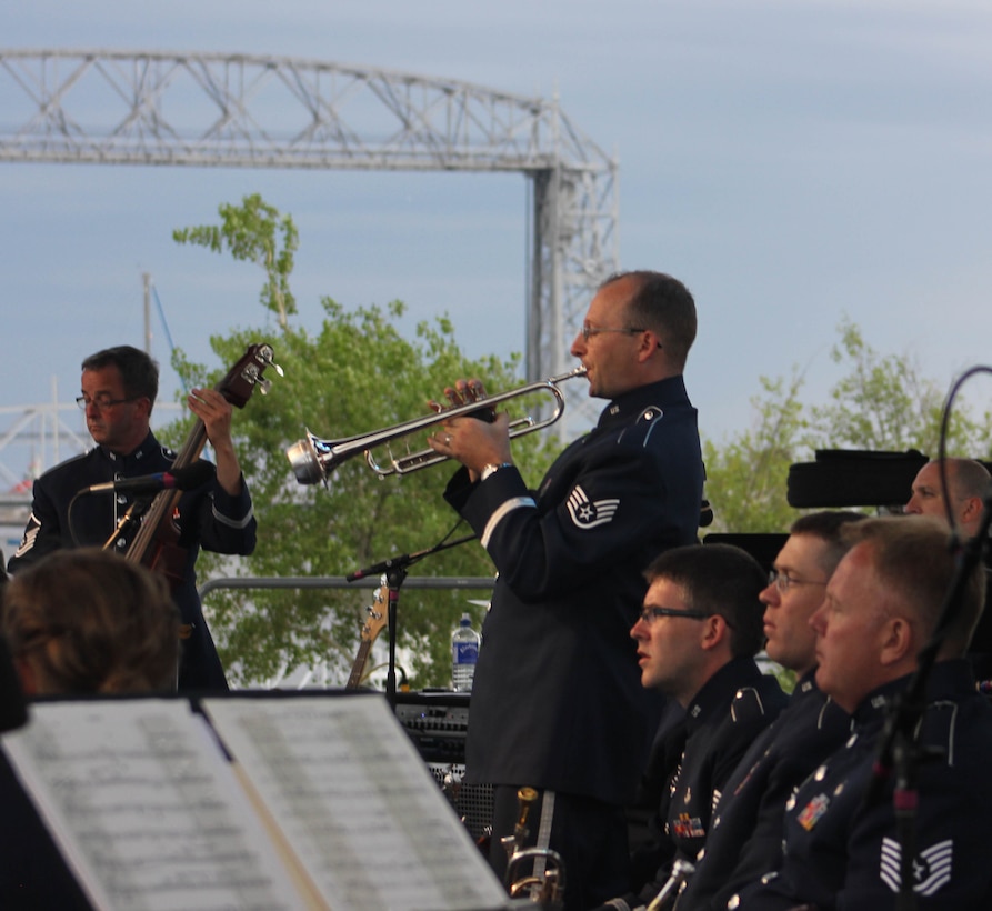Instrumentalists with the Air National Guard Band of the Midwest perform for audiences during annual training at the Bayfront Festival Park, Duluth, Minn., July 4, 2014. They performed jazz, rock and concert music for audiences in Illinois and Wisconsin as part of their community relations tour before a grand finale in Minnesota July 4. The annual concert series was the result of a year’s worth of training and practice, one that the band used to celebrate patriotism with communities across the Midwest. (Courtesy photo/Released)