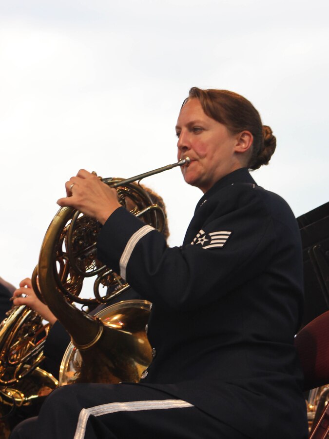 U.S. Air Force Staff Sgt. Sarah E. Kaiser, instrumentalist with the 566th Air Force Band, performs during the Air National Guard Band of the Midwest's annual training at the Bayfront Festival Park, Duluth, Minn., July 4, 2014. They performed jazz, rock and concert music for audiences in Illinois and Wisconsin as part of their community relations tour before a grand finale in Minnesota July 4. The annual concert series was the result of a year’s worth of training and practice, one that the band used to celebrate patriotism with communities across the Midwest. (Courtesy photo/Released)