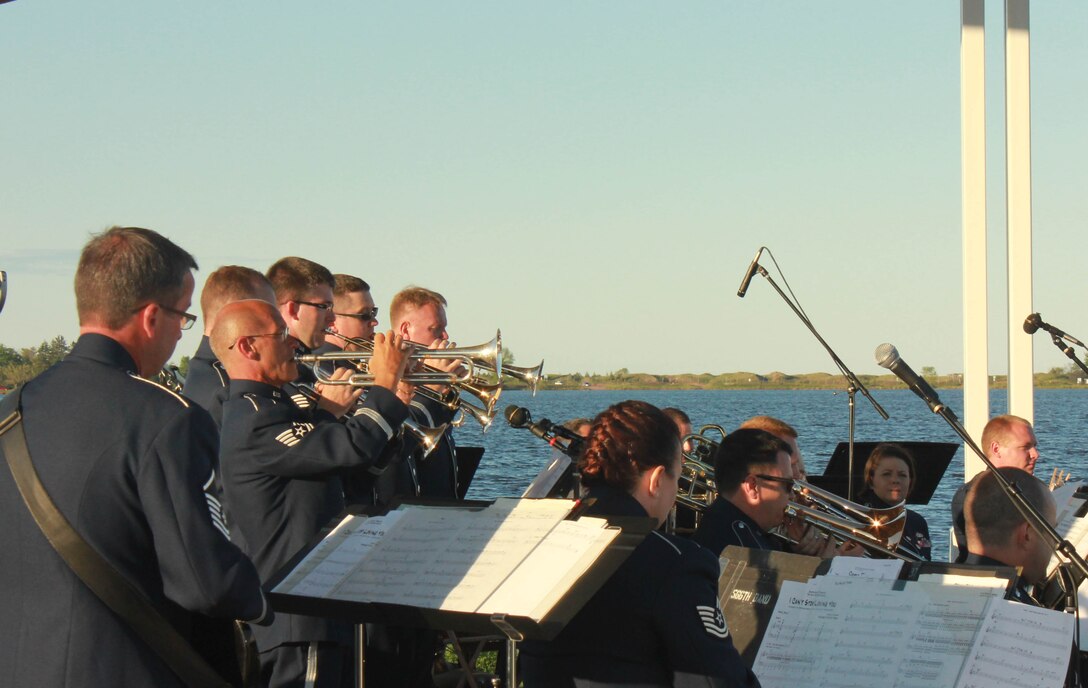 Instrumentalists with the Air National Guard Band of the Midwest perform for audiences during annual training at Barker’s Island Festival Park, Superior, Wis., July 3, 2014. They performed jazz, rock and concert music for audiences in Illinois and Wisconsin as part of their community relations tour before a grand finale in Minnesota July 4. The annual concert series was the result of a year’s worth of training and practice, one that the band used to celebrate patriotism with communities across the Midwest. (Courtesy photo/Released)
