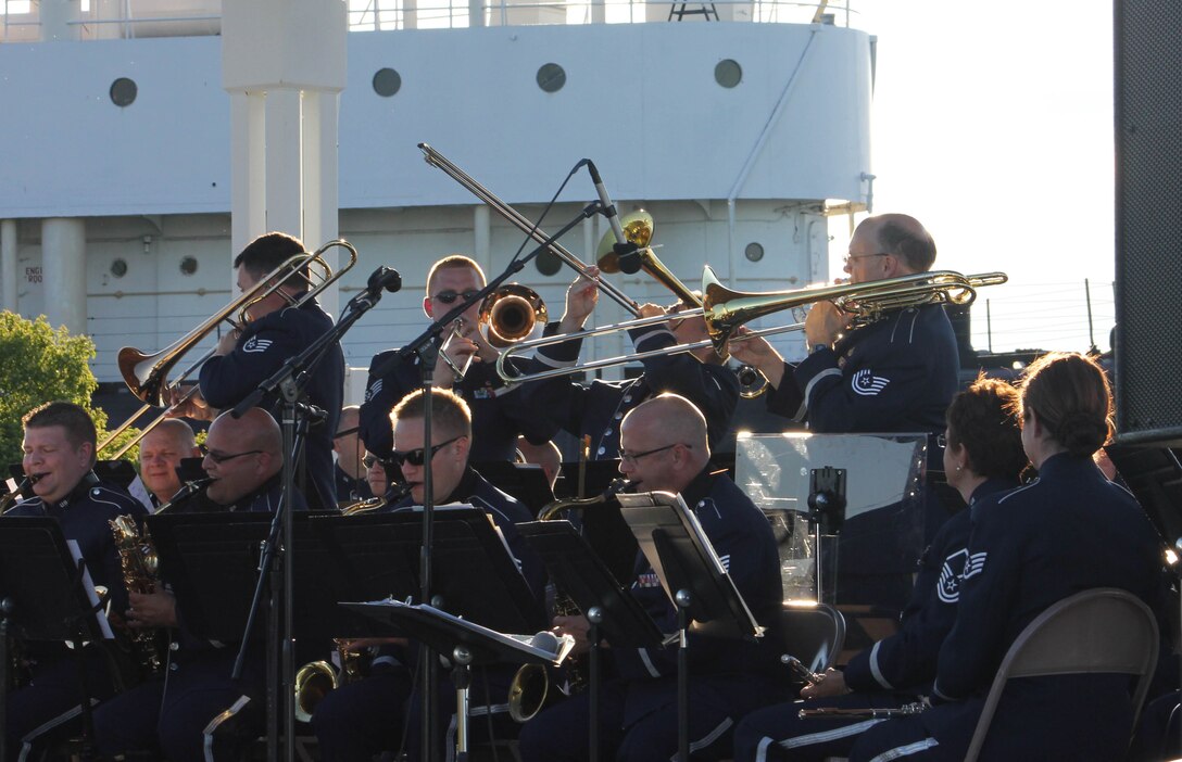 Instrumentalists with the Air National Guard Band of the Midwest perform for audiences during annual training at Barker’s Island Festival Park, Superior, Wis., July 3, 2014. They performed jazz, rock and concert music for audiences in Illinois and Wisconsin as part of their community relations tour before a grand finale in Minnesota July 4. The annual concert series was the result of a year’s worth of training and practice, one that the band used to celebrate patriotism with communities across the Midwest. (Courtesy photo/Released)