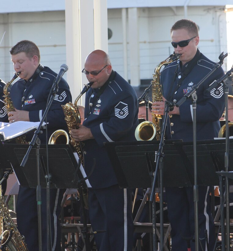 Instrumentalists with the Air National Guard Band of the Midwest perform for audiences during annual training at Barker’s Island Festival Park, Superior, Wis., July 3, 2014. They performed jazz, rock and concert music for audiences in Illinois and Wisconsin as part of their community relations tour before a grand finale in Minnesota July 4. The annual concert series was the result of a year’s worth of training and practice, one that the band used to celebrate patriotism with communities across the Midwest. (Courtesy photo/Released)