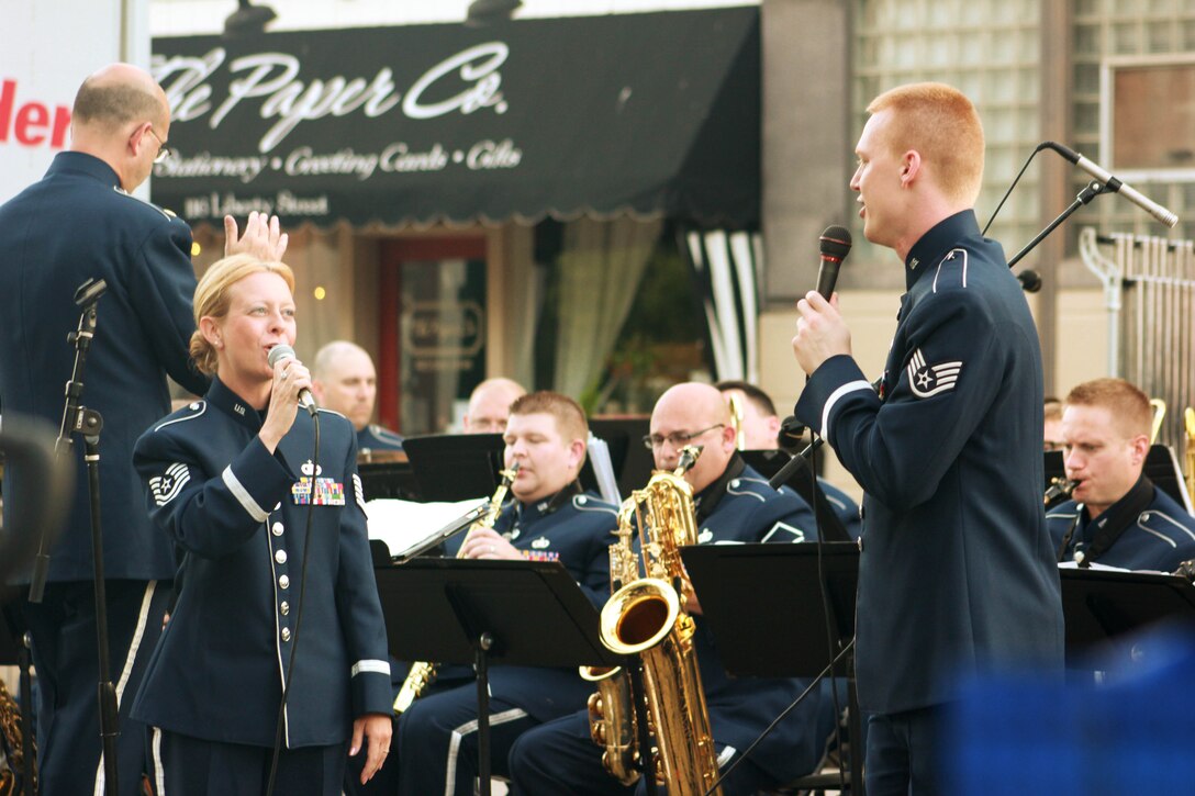 Instrumentalists with the Air National Guard Band of the Midwest perform for audiences during annual training at the Grundy County Courtyard Lawn, Morris, Ill., June 29, 2014. They performed jazz, rock and concert music for audiences in Illinois and Wisconsin as part of their community relations tour before a grand finale in Minnesota July 4. The annual concert series was the result of a year’s worth of training and practice, one that the band used to celebrate patriotism with communities across the Midwest. (Courtesy photo/Released)