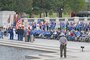 A military color guard sang the National Anthem and played Taps for Utah Honor Flight veterans upon their arrival at the World War II Memorial in Washington, D.C., Sept. 19, 2014. The veterans were part of a group of 66 that were there to see their memorial, many for the first time.(U.S. Air Force photo by Senior Master Sgt. Gary J. Rihn/Released)