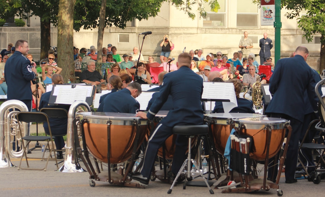 Instrumentalists with the Air National Guard Band of the Midwest perform for audiences during annual training at the Grundy County Courtyard Lawn, Morris, Ill., June 29, 2014. They performed jazz, rock and concert music for audiences in Illinois and Wisconsin as part of their community relations tour before a grand finale in Minnesota July 4. The annual concert series was the result of a year’s worth of training and practice, one that the band used to celebrate patriotism with communities across the Midwest. (Courtesy photo/Released)