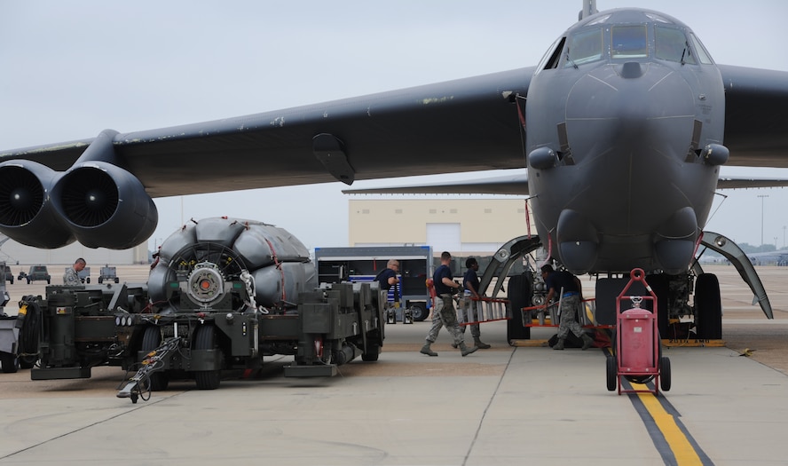 Airmen from the 20th Aircraft Maintenance Unit begin a weapons load competition on Barksdale Air Force Base, La., Sept. 19, 2014.  The quarterly competition is performed to determine the best load team on Barksdale. The competition consisted of a uniform inspection, system knowledge test and the weapon load process. (U.S. Air Force photo/Senior Airman Jannelle Dickey)