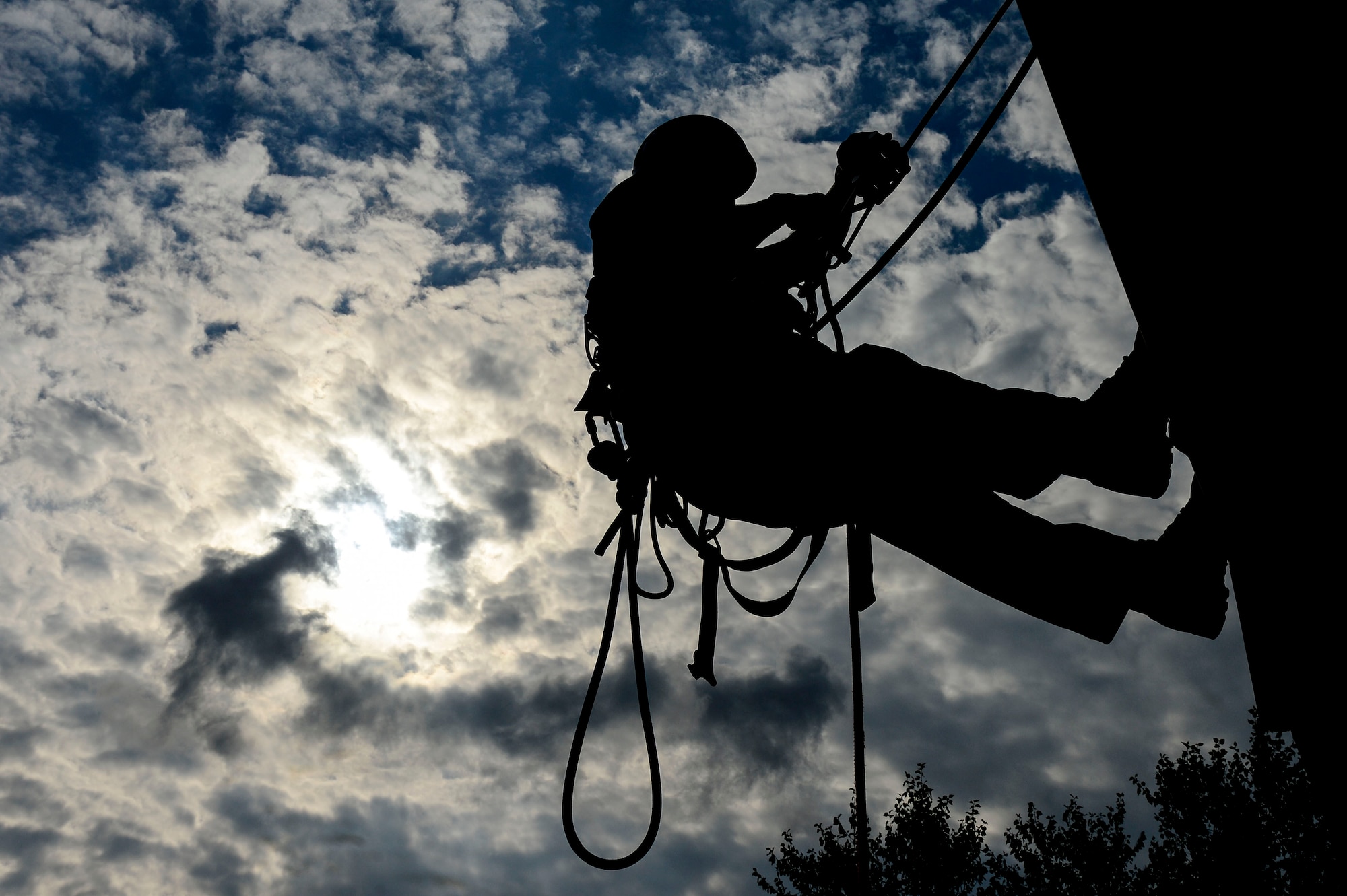 A U.S. Air Force firefighter participates in high angle rescue training at Langley Air Force Base, Va., Sept. 17, 2014. The training was part of a 15 day course, led by two instructors from the Louis F. Garland Department of Defense Fire Academy. (U.S. Air Force photo by Senior Airman Kayla Newman/Released)