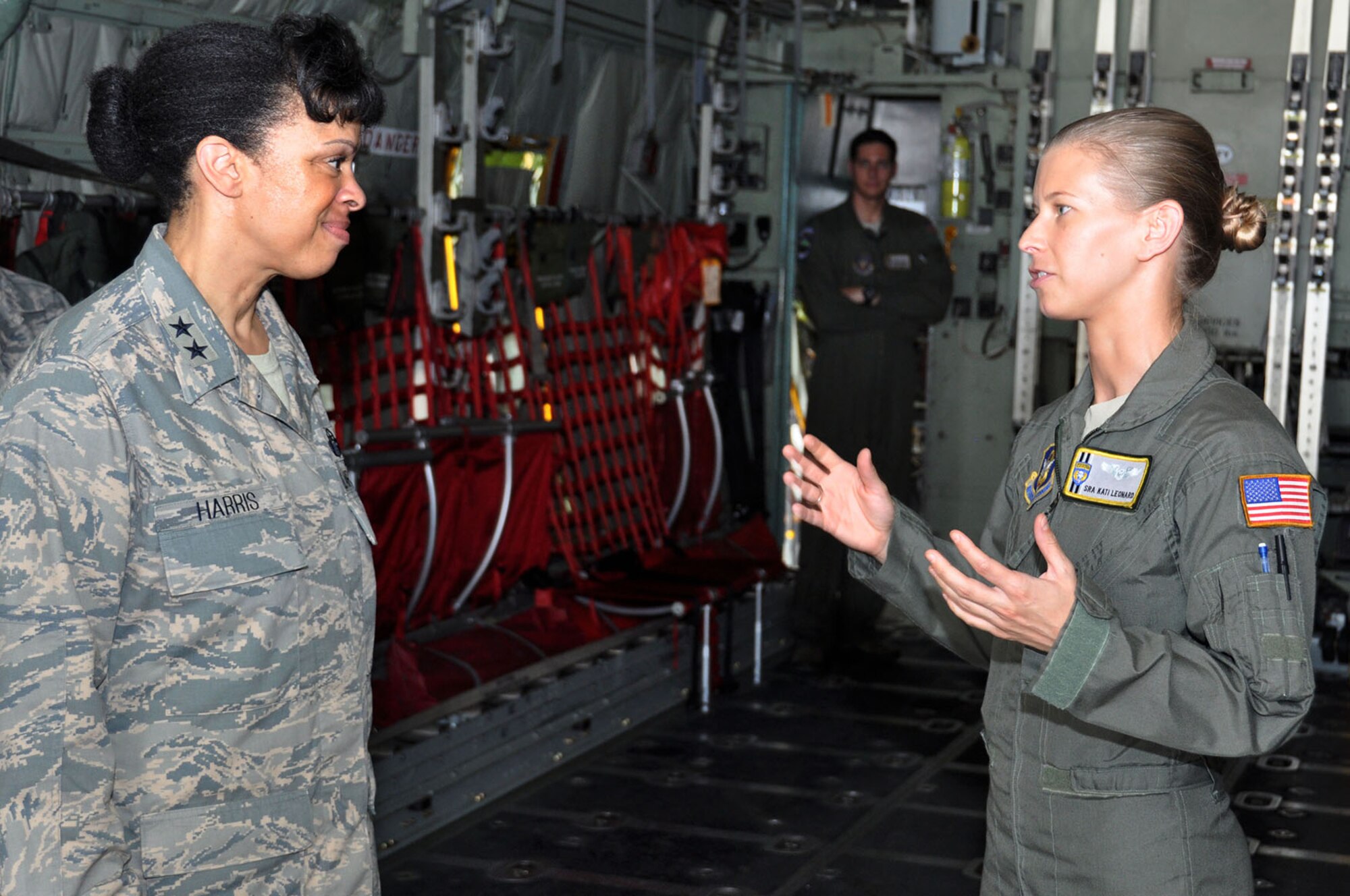 Senior Airman Kati Leonard, a loadmaster with the 440th Airlift Wing, talks with Harris during the general’s recent visit to Pope Field, North Carolina. (Staff Sgt. Mark Thompson)