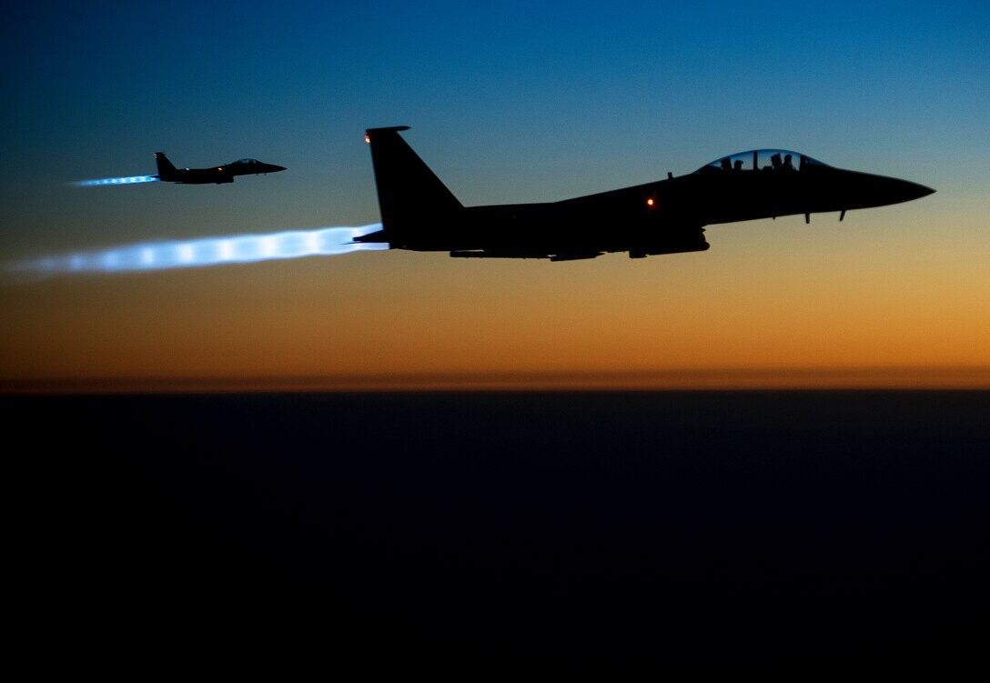 A pair of U.S. Air Force F15E Strike Eagles fly over northern Iraq