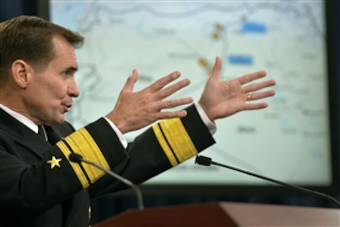 Pentagon Press Secretary Navy Rear Adm. John Kirby briefs reporters at the Pentagon, Sept. 25, 2014. Kirby showed slides and videos highlighting U.S. airstrikes on Islamic State of Iraq and the Levant targets in Syria and answered questions from reporters. DoD photo by Glenn Fawcett 
