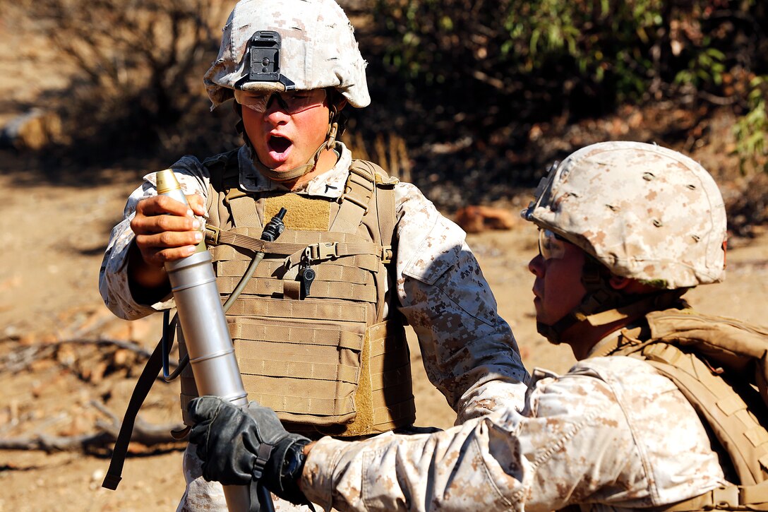 Entry-level Marines with Alpha Company, Infantry Training Battalion, School of Infantry-West completed their culminating event at Range 408 here, Sept. 25. The range includes and implements the different infantry occupational specialties at the company level. Medium/light machine guns and mortars suppress the enemy first, providing the supporting fire for a squad size element of riflemen and assaultmen to assault the enemies’ position. 

Infantry Training Battalion trains all infantry, entry-level Marines in the skills essential to operating combat environment. Infantry Training Battalion is a 52-day training course that transforms the raw Marine into an infantryman who can fight, survive, and win in a combat situation.
