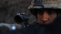 A Marine with Company L, 3rd Battalion, 1st Marine Regiment, provides security before starting a movement to the company objective during the Marine Corps Combat Readiness Evaluation aboard Marine Corps Base Camp Pendleton, Calif., Sept. 22, 2014. The MCCRE is designed to be a final evaluation to ensure the Marines are prepared to be deployed. The battalion is slated to deploy as the ground combat element of the 15th Marine Expeditionary Unit next year.