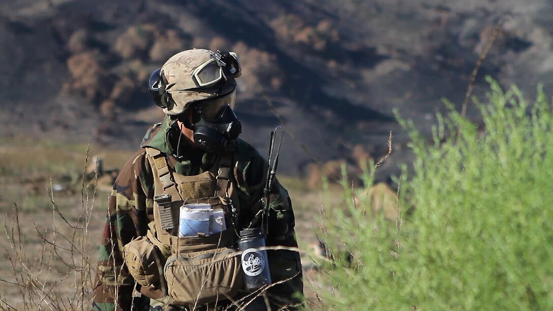 A rifleman with Co. Lima, 3rd Battalion, 1st Marine Regiment, observes his defensive positions during the Marine Corps Combat Readiness Evaluation aboard Marine Corps Base Camp Pendleton, Calif., Sept. 22, 2014. The MCCRE is designed to be a final evaluation to ensure the Marines are prepared to be deployed. The battalion is slated to deploy as the ground combat element of the 15th Marine Expeditionary Unit next year.