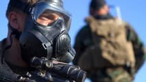 Riflemen with Company L, 3rd Battalion, 1st Marine Regiment, prepare for gas drills during the Marine Corps Combat Readiness Evaluation aboard Marine Corps Base Camp Pendleton, Calif., Sept. 24, 2014. The MCCRE is designed to be a final evaluation to ensure the Marines are prepared to be deployed. The battalion is slated to deploy as the ground combat element of the 15th Marine Expeditionary Unit next year.