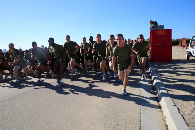 Recruits of Fox Company, 2nd Recruit Training Battalion, begin a three-mile run during their final physical fitness test at Marine Corps Recruit Depot San Diego, Calif., Sept. 25. The run is the second exercise of a three-part physical fitness test recorded for score. 
