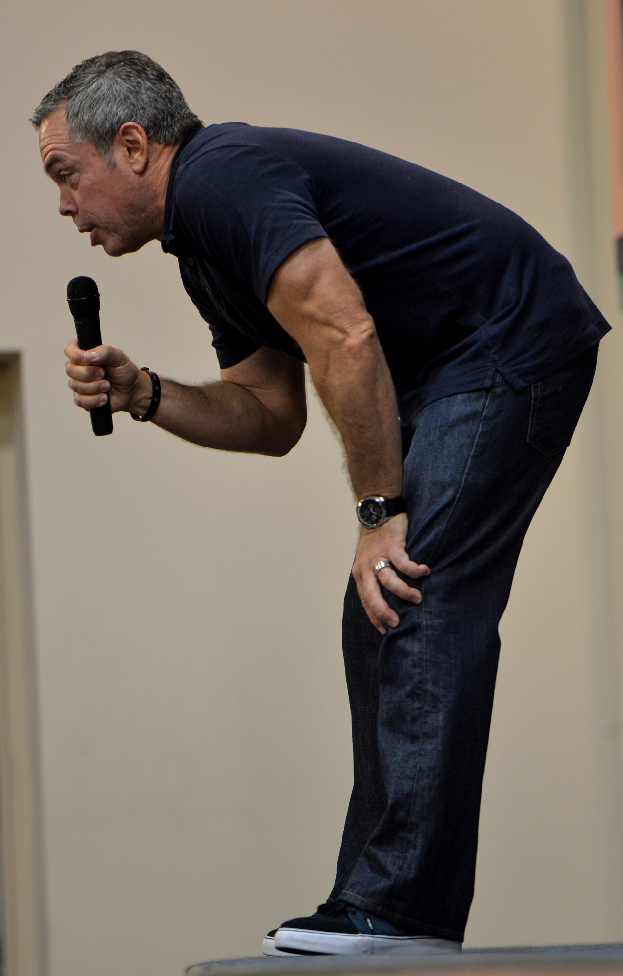 Comedian Bernie McGrenahan speaks during resiliency training at King Auditorium, Hurlburt Field, Fla., Sept. 24, 2014. The training focused on the importance of resiliency with a humor filled presentation. (U.S. Air Force photo/Senior Airman Christopher Callaway)  