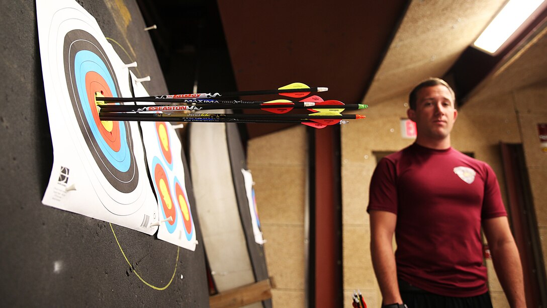 Sgt. Allen Melick, from Brighton, Michigan, makes notes of his shots during archery practice for the Marine team, September 24, in preparation for the 2014 Warrior Games. The Marine team has been training since September 15 in order to build team cohesion and acclimate to the above 6,000 ft. altitude of Colorado Springs. The Marine team is comprised of both active duty and veteran wounded, ill and injured Marines who are attached to or supported by the Wounded Warrior Regiment, the official unit of the Marine Corps charged with providing comprehensive non-medical recovery care to wounded, ill and injured Marines. 
