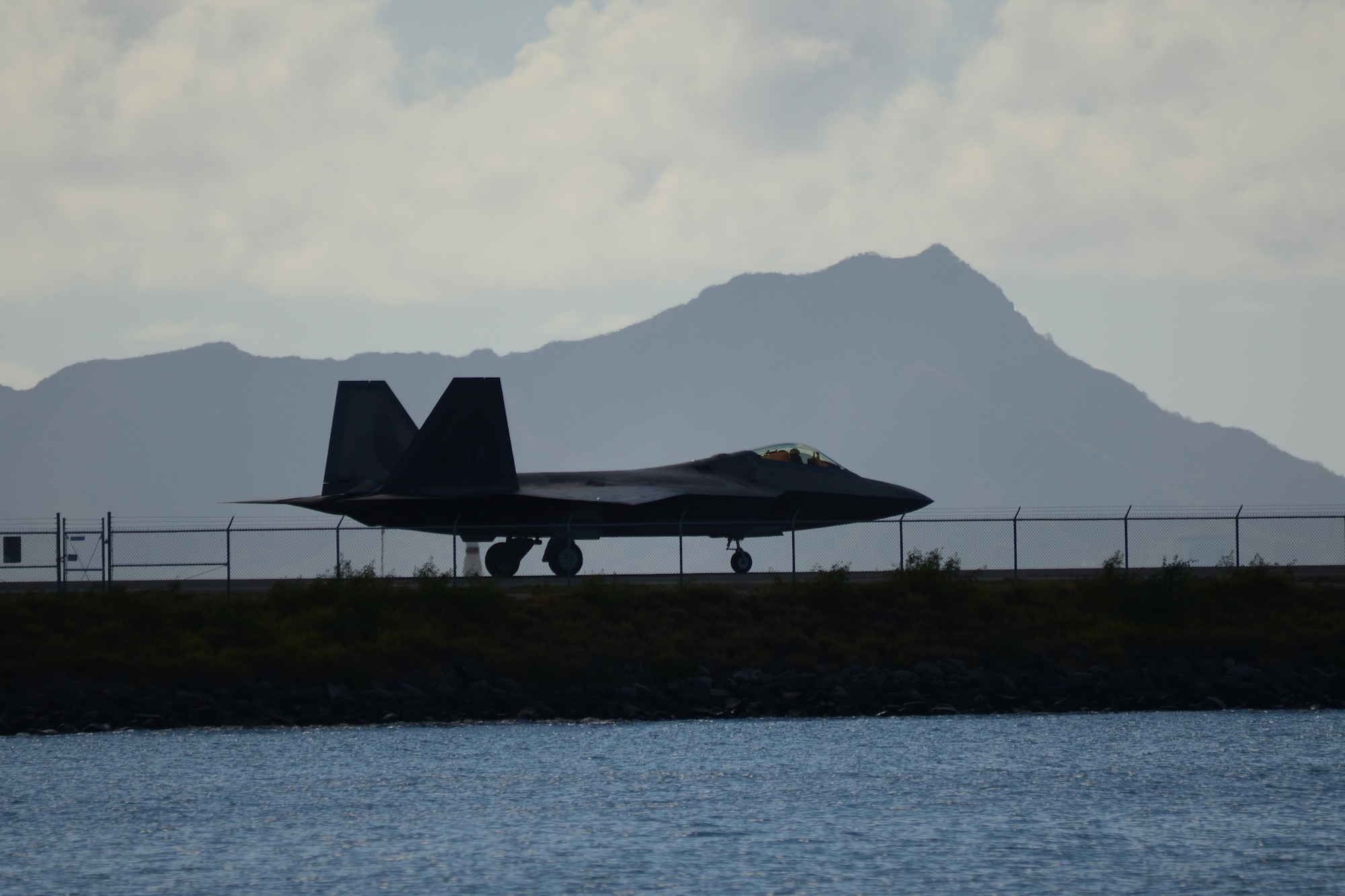 An F-22 Raptor taxis in preparation to take-off from Joint Base Pearl Harbor-Hickam, Hawaii. The Raptor flew as part of the 477th Fighter Group’s first ever group-wide off station annual tour (U.S. Air Force photo/Tech. Sgt. Dana Rosso)