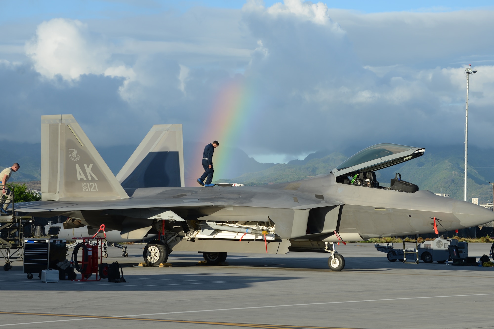 Tech. Sgt. Jose Garza, 477th Maintenance Squadron F-22 crew chief, inspects the top of an F-22 during the 477th Fighter Group’s first ever group-wide off station annual tour at Joint Base Pearl Harbor Hickam, Hawaii Sept. 5, 2014. (U.S. Air Force photo/Tech. Sgt. Dana Rosso)