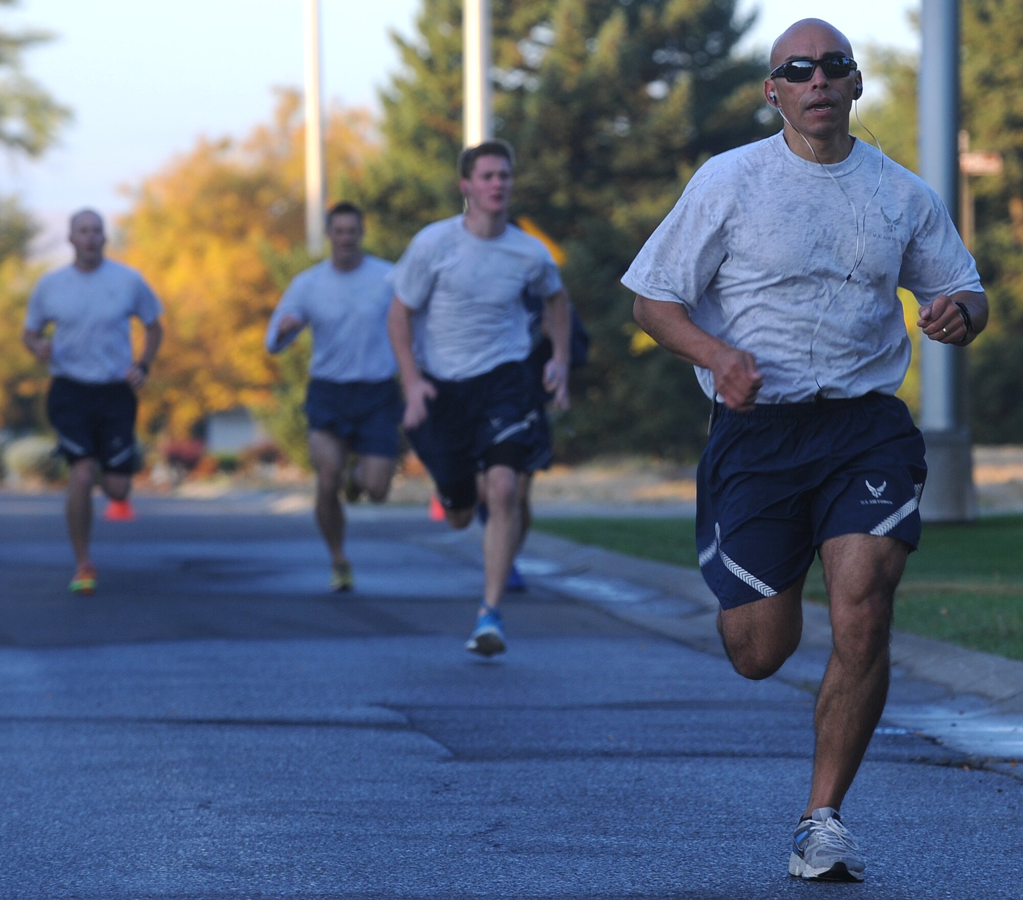 Members of Team Fairchild finish the last wing run of the year at Fairchild Air Force Base, Washington, Sept. 26, 2014. The run is about 1.5 miles and allows Airmen to enhance unit cohesion through team morale and welfare. (U.S. Air Force photo by Staff Sgt. Samantha Krolikowski/Released) 