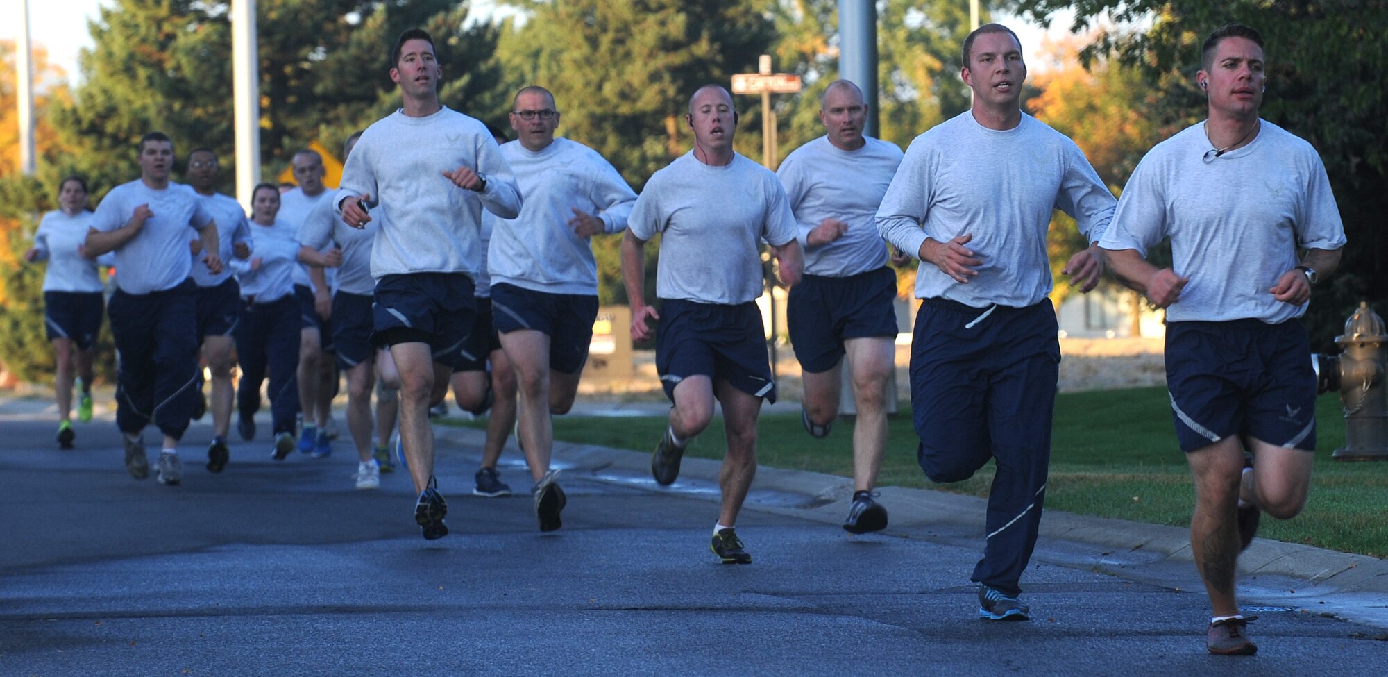 Members of Team Fairchild participate in the last wing run of the year at Fairchild Air Force Base, Washington, Sept. 26, 2014.  Wing rungs allow Airmen to personally assess their physical fitness and enhance unit cohesion through team morale and welfare. (U.S. Air Force photo by Staff Sgt. Samantha Krolikowski/Released) 