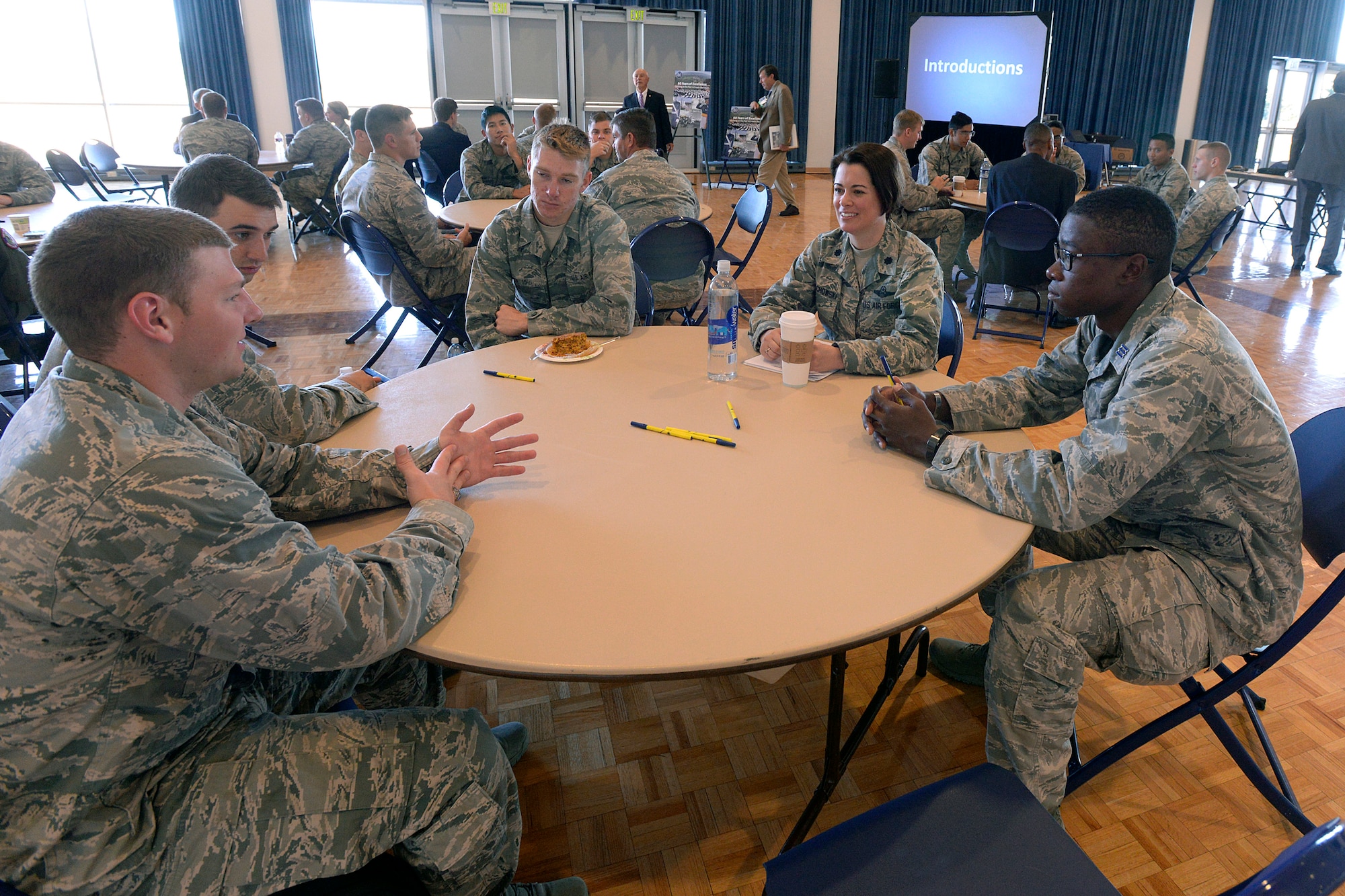 Lt. Col. Nicole Malachowski, Class of '96, chats with cadets on character and leadership at a roundtable discussion during the 2014 Falcon Heritage Forum. Malachowski is a former Air Force fighter pilot and first woman to fly for the Thunderbirds, the Air Force’s premier aerial demonstration team. (U.S. Air Force photo/ Mike Kaplan)