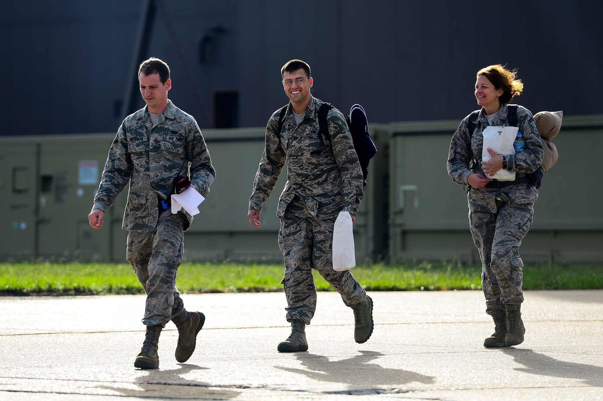 U.S. Air Force Airmen assigned to the 633rd Medical Group walk towards a C-17 Globemaster at Langley Air Force Base, Va., Sept. 26, 2014. The 633rd MDG deployed to West Africa in support of Operation United Assistance, where they will deliver and build the Air Force’s Expeditionary Medical Support System. Langley Airmen will not be involved in treatment of patients exposed to the Ebola virus.  (U.S. Air Force photo by Senior Airman Kayla Newman/Released)