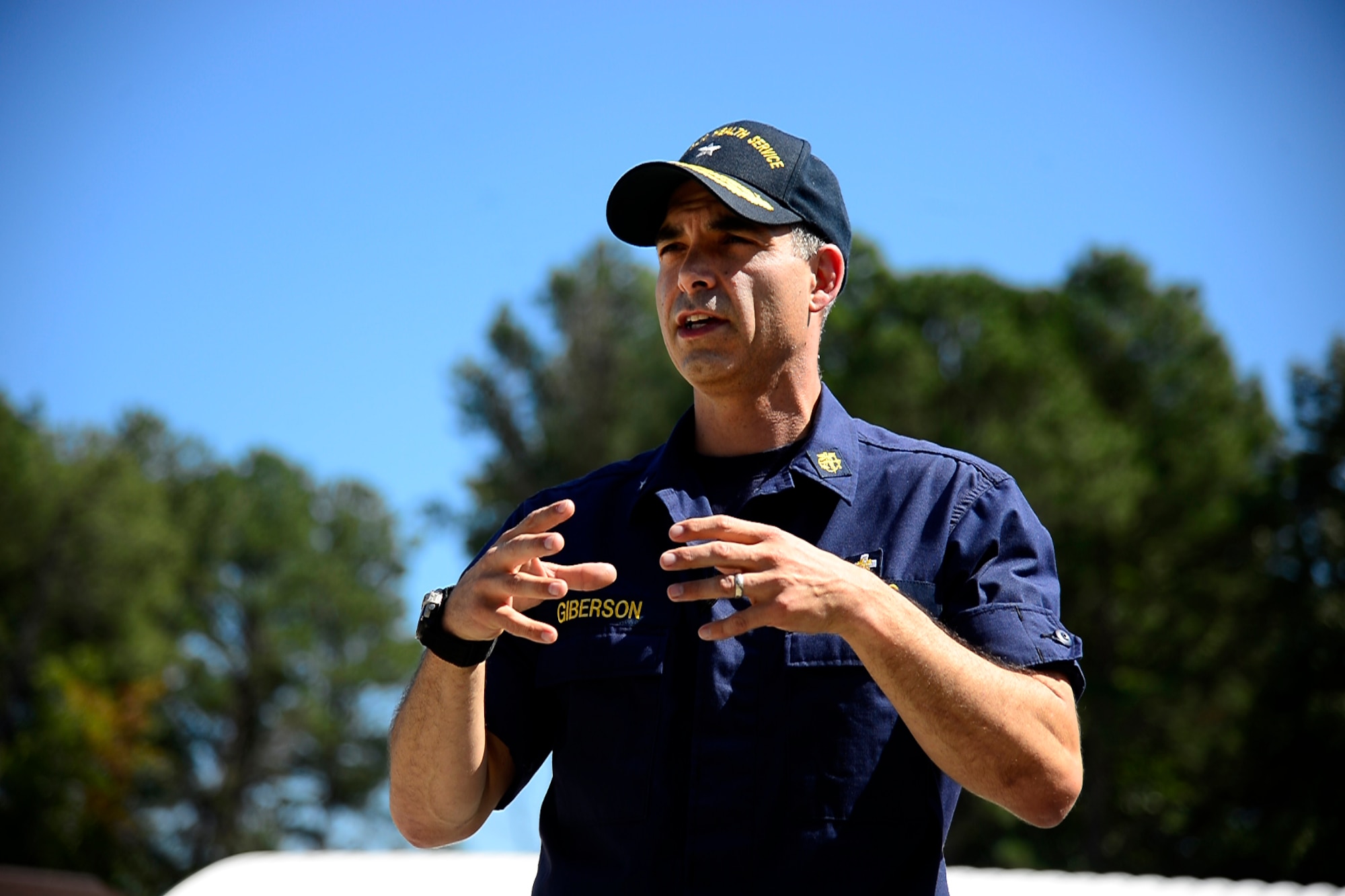 U.S. Public Health Service Rear Adm. Scott Giberson, U.S. Public Health Services acting deputy surgeon general, speaks about the role of the USPHS in responding and containing the outbreak of the Ebola virus in West Africa during an interview at Langley Air Force Base, Va., Sept. 22, 2014. The outbreak is the largest in history and the first epidemic in West Africa. (U.S. Air Force photo by Senior Airman Kayla Newman/Released)