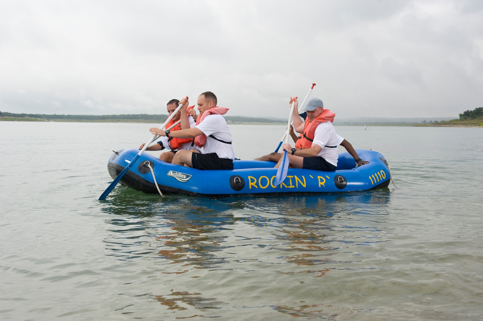 Participants of the Rambler 120 Adventure Race at Joint Base San Antonio Recreation Park on Canyon Lake, finish strong at the last rafting portion of the race Sept. 20, 2014. Immediately after the six-mile run, teams grab their rafting gear and paddle the two-mile rafting route.  (U.S. Air Force photo by Airman Justine K. Rho/released)