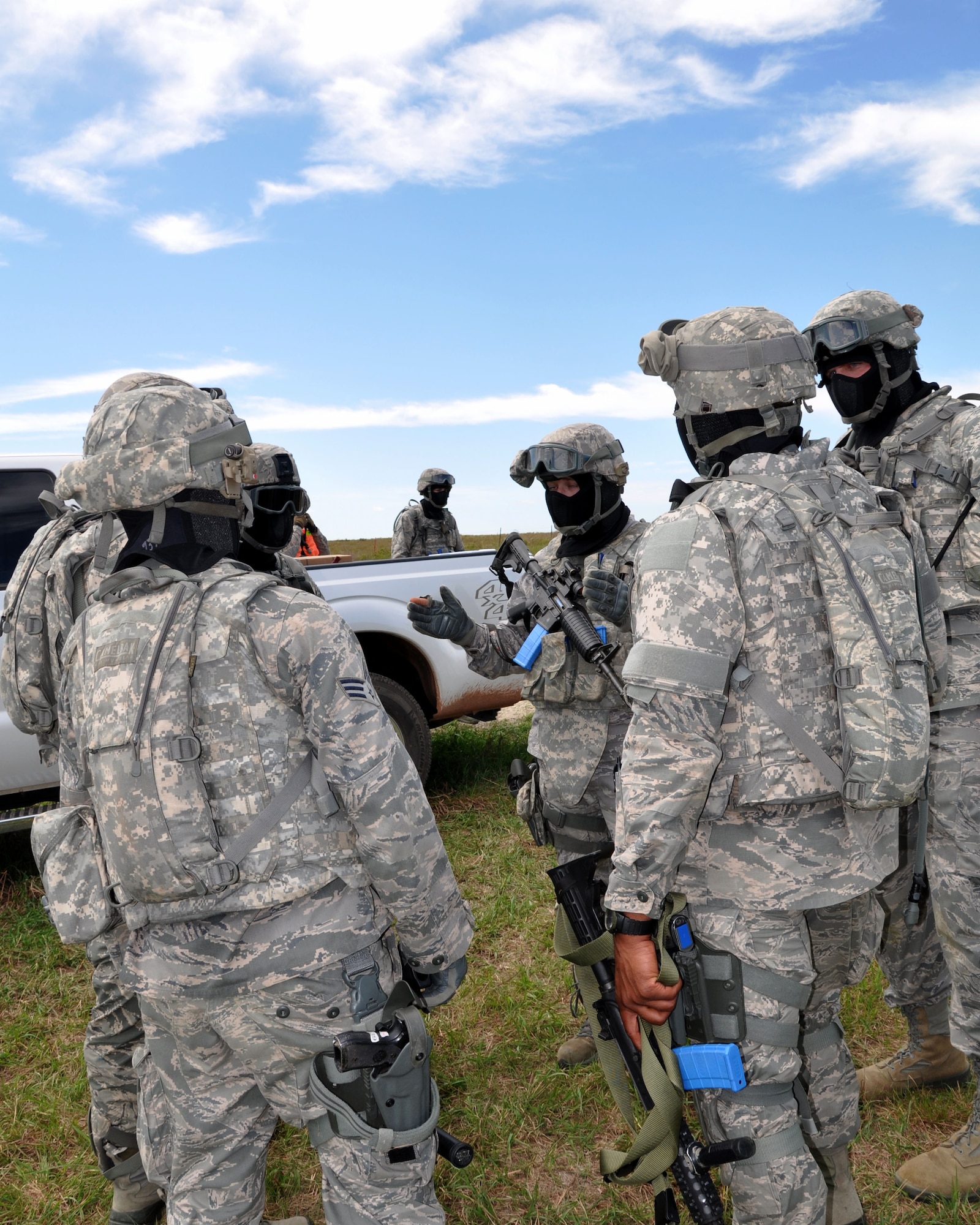 Member of the 931st Security Forces Squadron prepare for their two-day training scenario at Smoky Hill Training Site on Sept. 7, 2014, Salina, Kan.  The training was part of an annual Air Force requirement, and realistically simulated actual combat conditions these Airmen may encounter while deployed.  (U.S. Air Force photo by Maj. Martha Kuder)