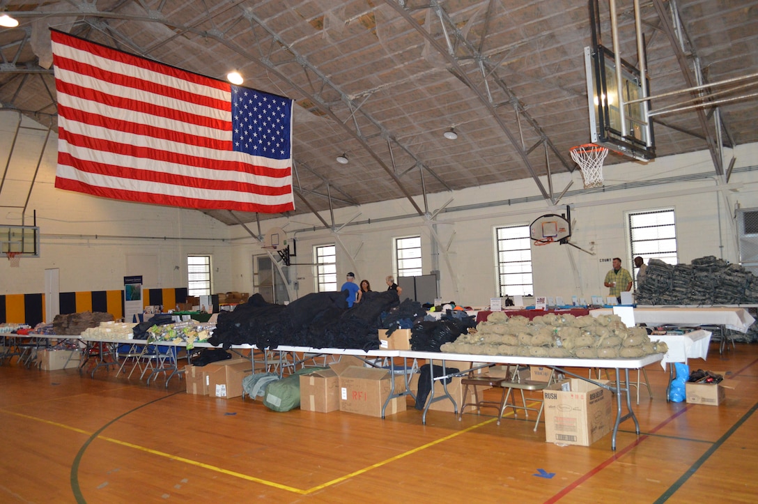 The gymnasium on the second floor the Family Life Center of First Baptist Church in Panama City is filled with items to be distributed to veterans during the Homeless Veterans Stand Down Sept. 25 at the Family Life Center of First Baptist Church in Panama City. Approximately 120 veterans attended the event which included hot meals, medical services, Veterans Affairs and housing assistance. (Photo by Mary McHale)