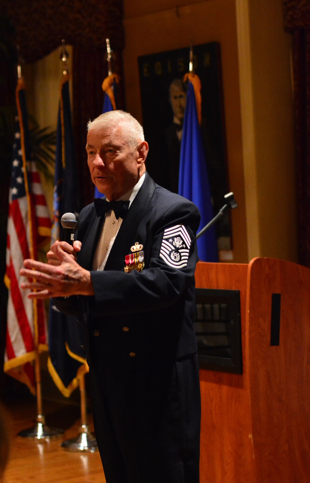 Retired Chief Master Sgt. of the Air Force Robert D. Gaylor speaks at the 109th Airlift Wing's Senior Noncommissioned Officer Induction Ceremony at Schenectady County Community College, Schenectady, New York, on Sept. 25, 2014. Gaylor visited Stratton Air National Guard Base earlier in the day to speak to a group of enlisted Airmen as well. He joined the Air Force in 1948 and became the fifth chief master sgt. of the Air Force in 1977. (U.S. Air National Guard photo by Master Sgt. William Gizara/Released)